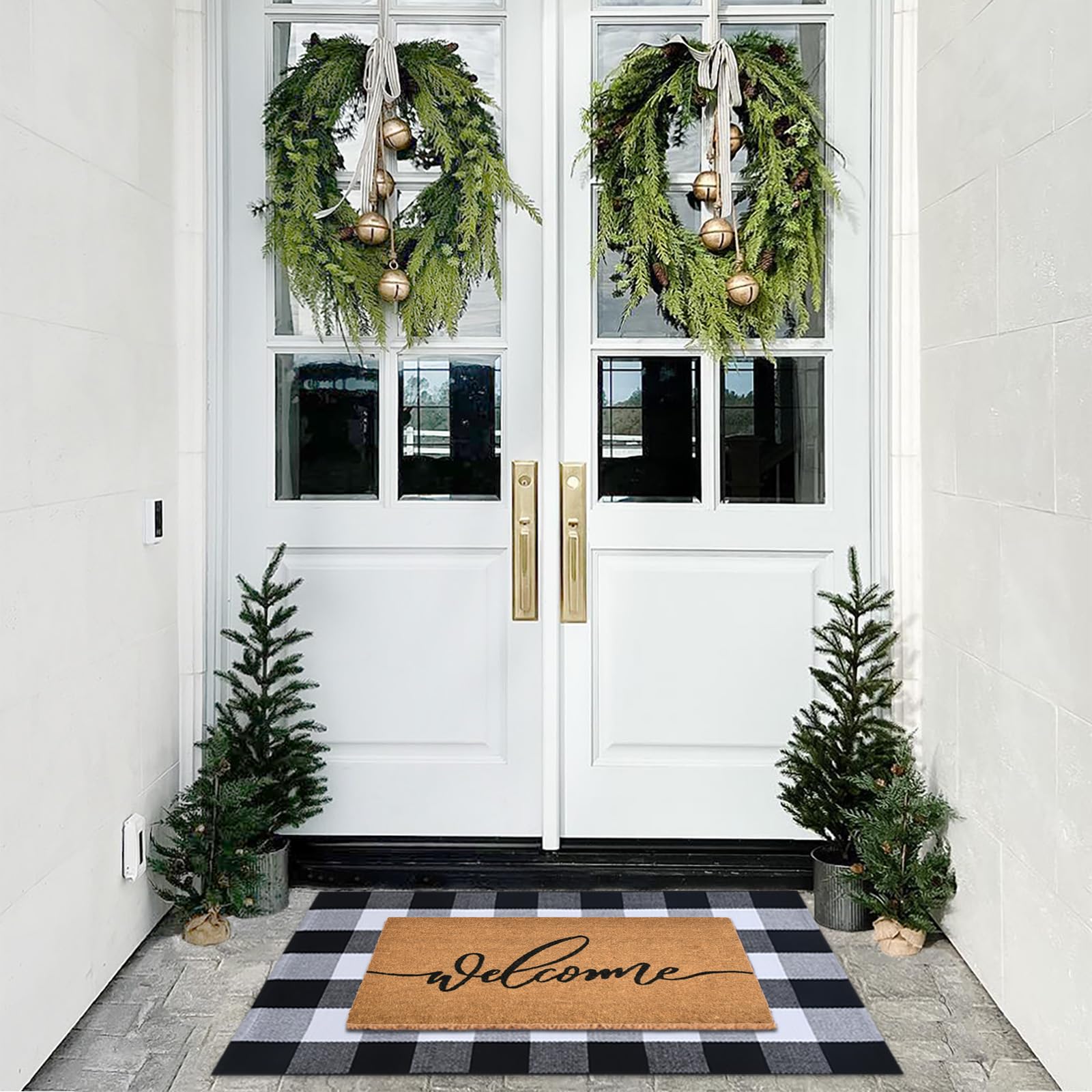 Fallovea front porch setup pairing mat and plaid rug for welcome.