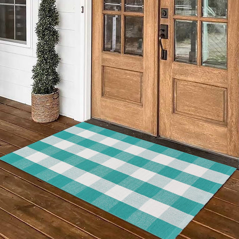 Fallovea plaid rug front porch doorway add curb appeal and welcome guests.