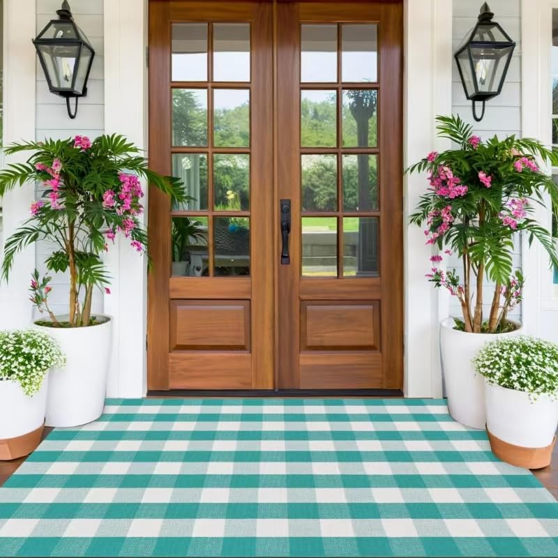 Fallovea front porch rug in green and white plaid, a durable outdoor-ready entrance mat.