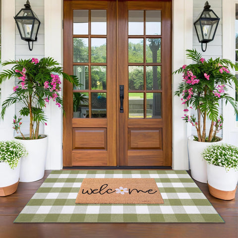 Fallovea Spring Welcome Doormat with flower motif greets guests at the door.