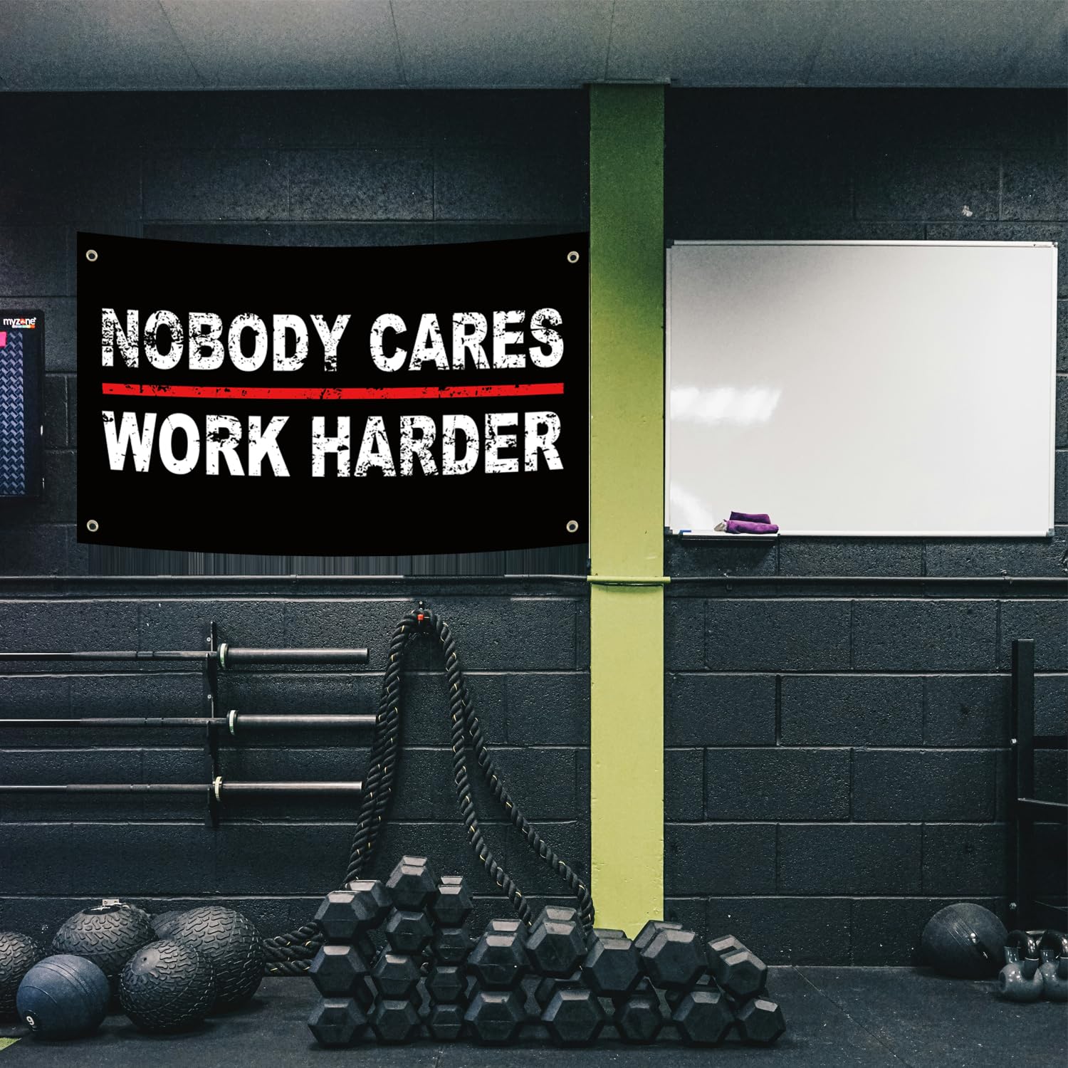 FAMXAKAFLY Nobody Cares flag in gym area boosting workout focus.