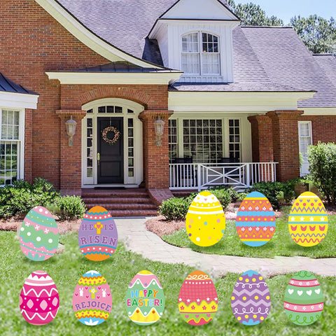 Fanboxk Easter eggs yard sign kit displayed on a welcoming lawn.