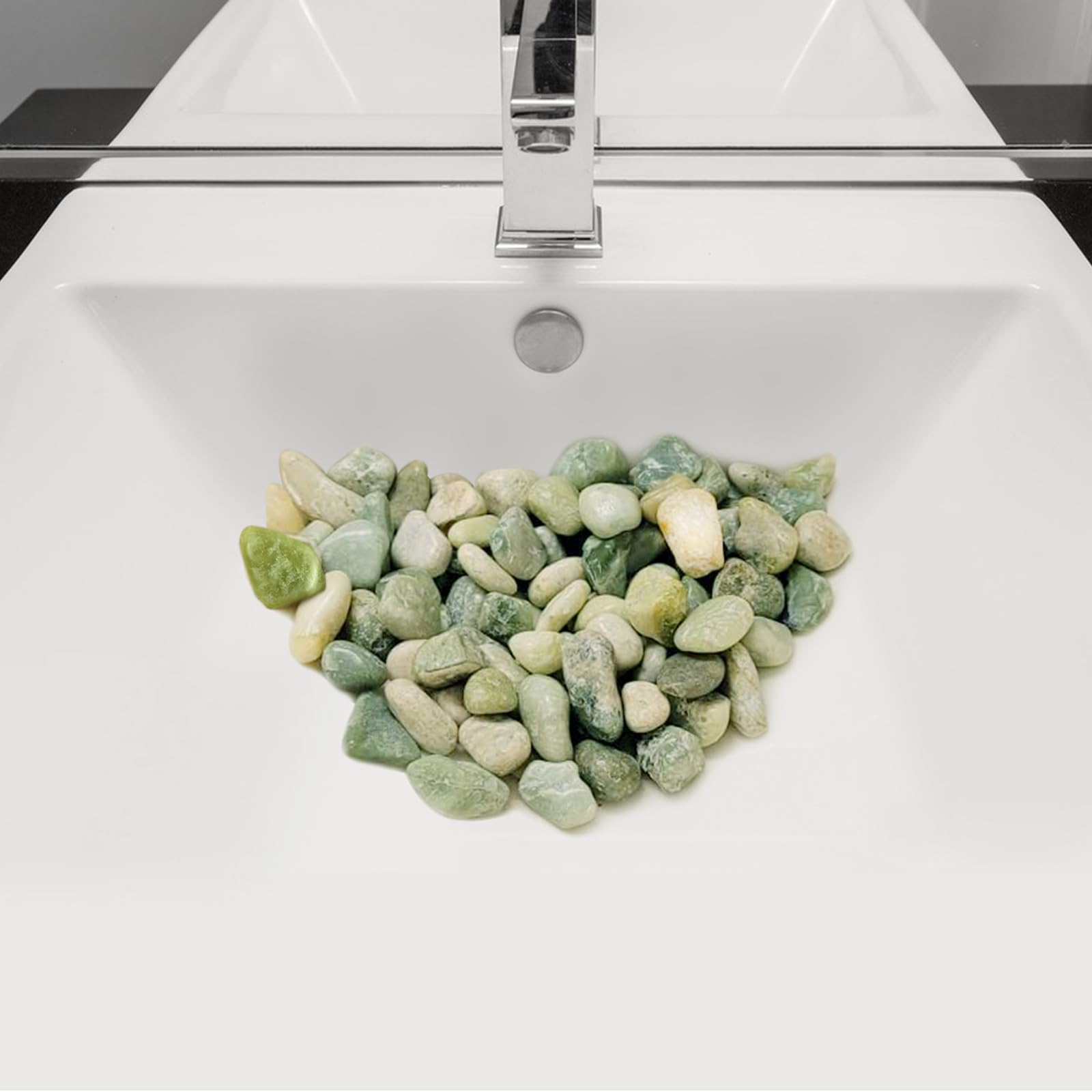 FANTIAN Jade Rocks decorating a candle holder with refined texture.