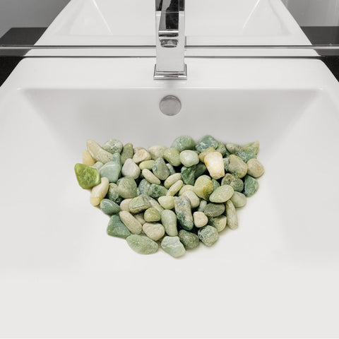 FANTIAN Jade Rocks decorating a candle holder with refined texture.