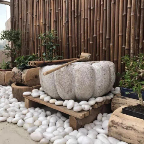 FANTIAN stones as plant pot coverings provide moisture control and style.