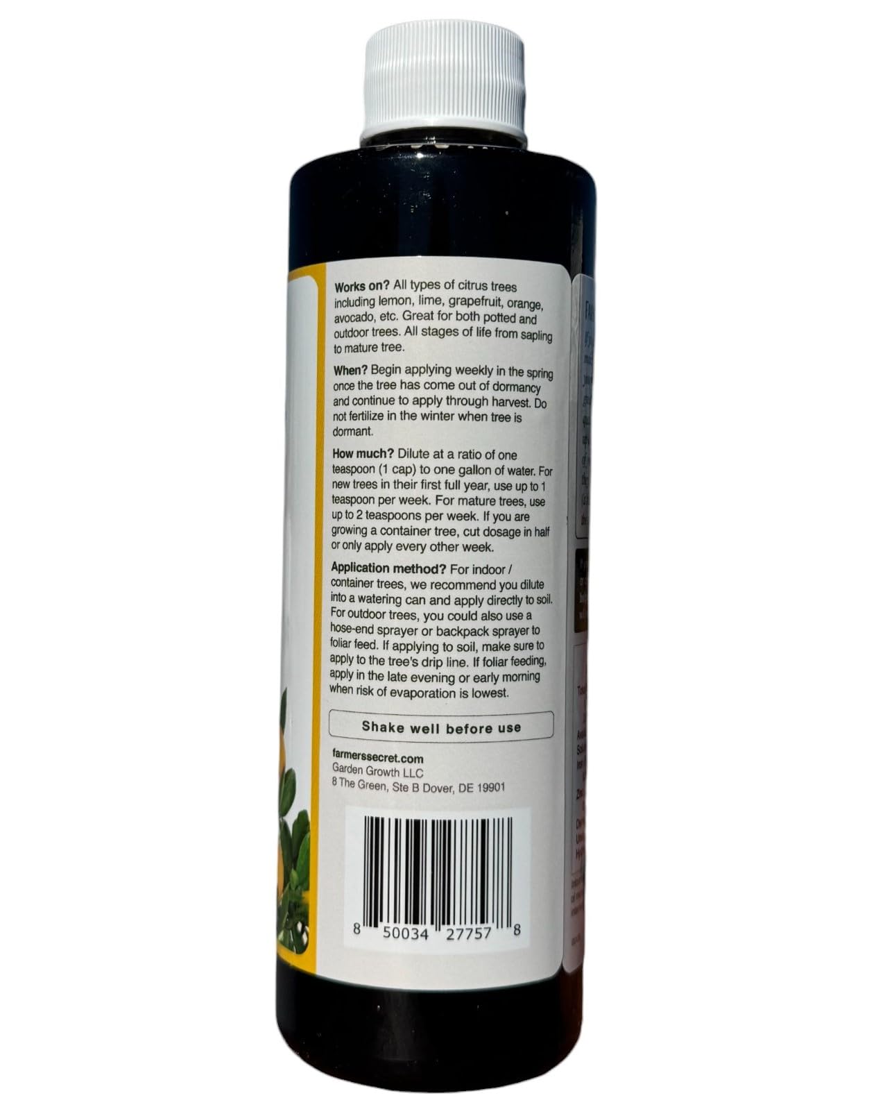 Farmer's Secret measuring spoon beside booster for precise weekly dilution