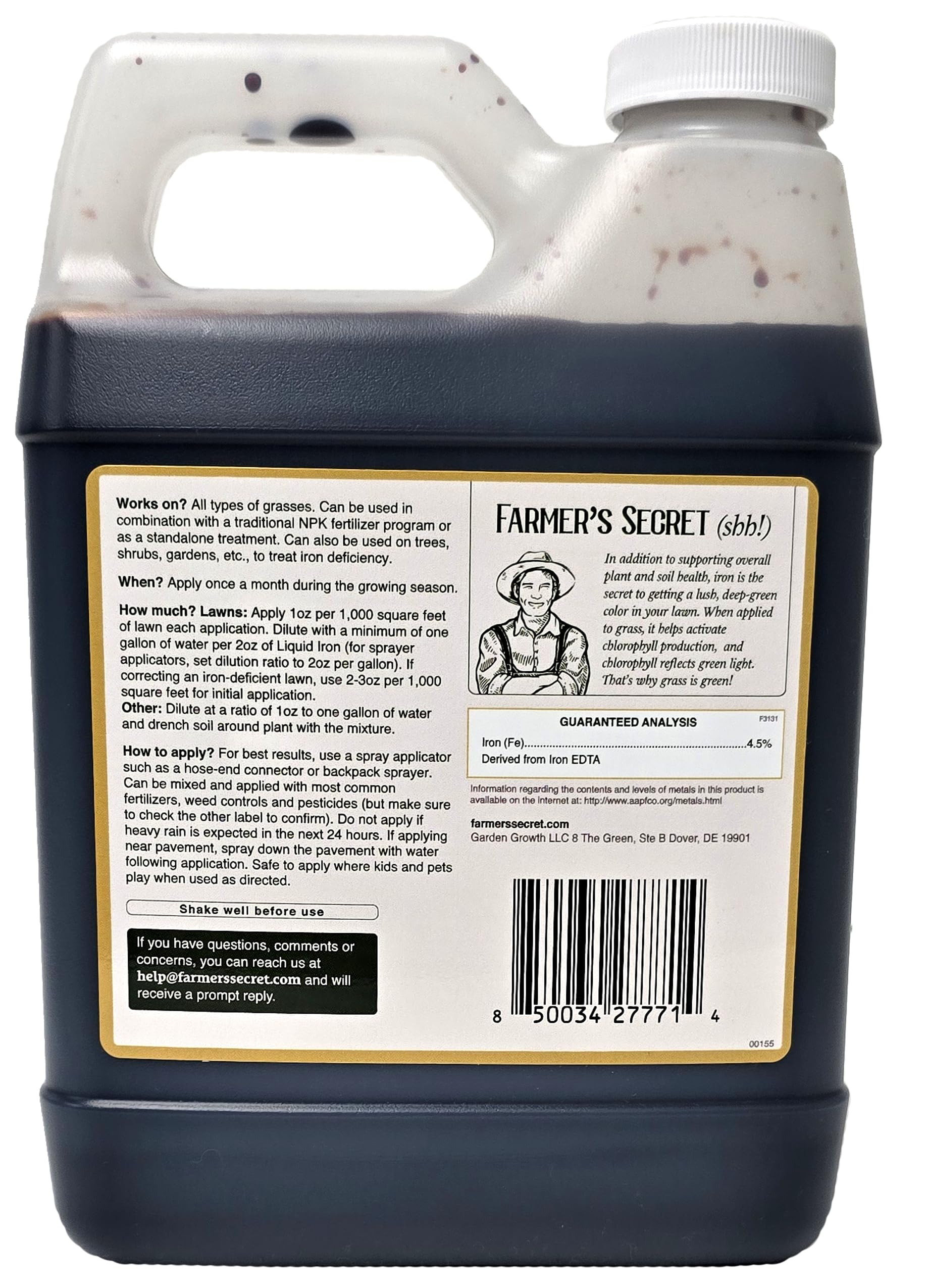 Farmer’s Secret Liquid Iron applied via hose-end for even lawn coverage.