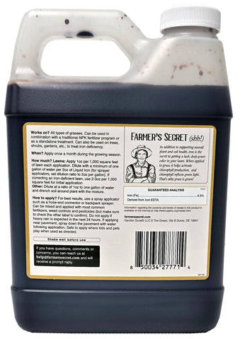 Farmer’s Secret Liquid Iron applied via hose-end for even lawn coverage.