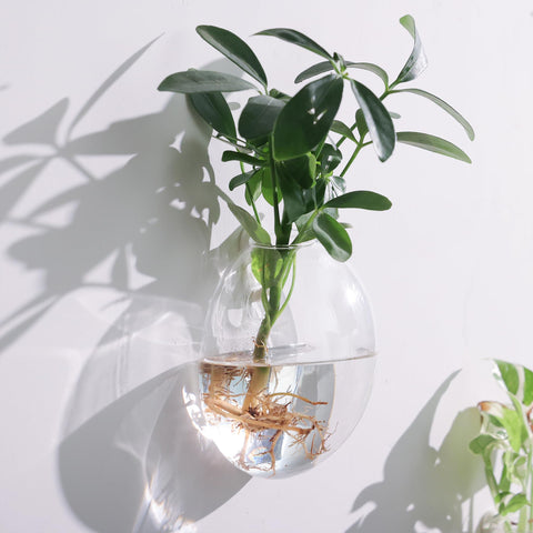 Fashionstorm wedding centerpiece idea with glass wall planters