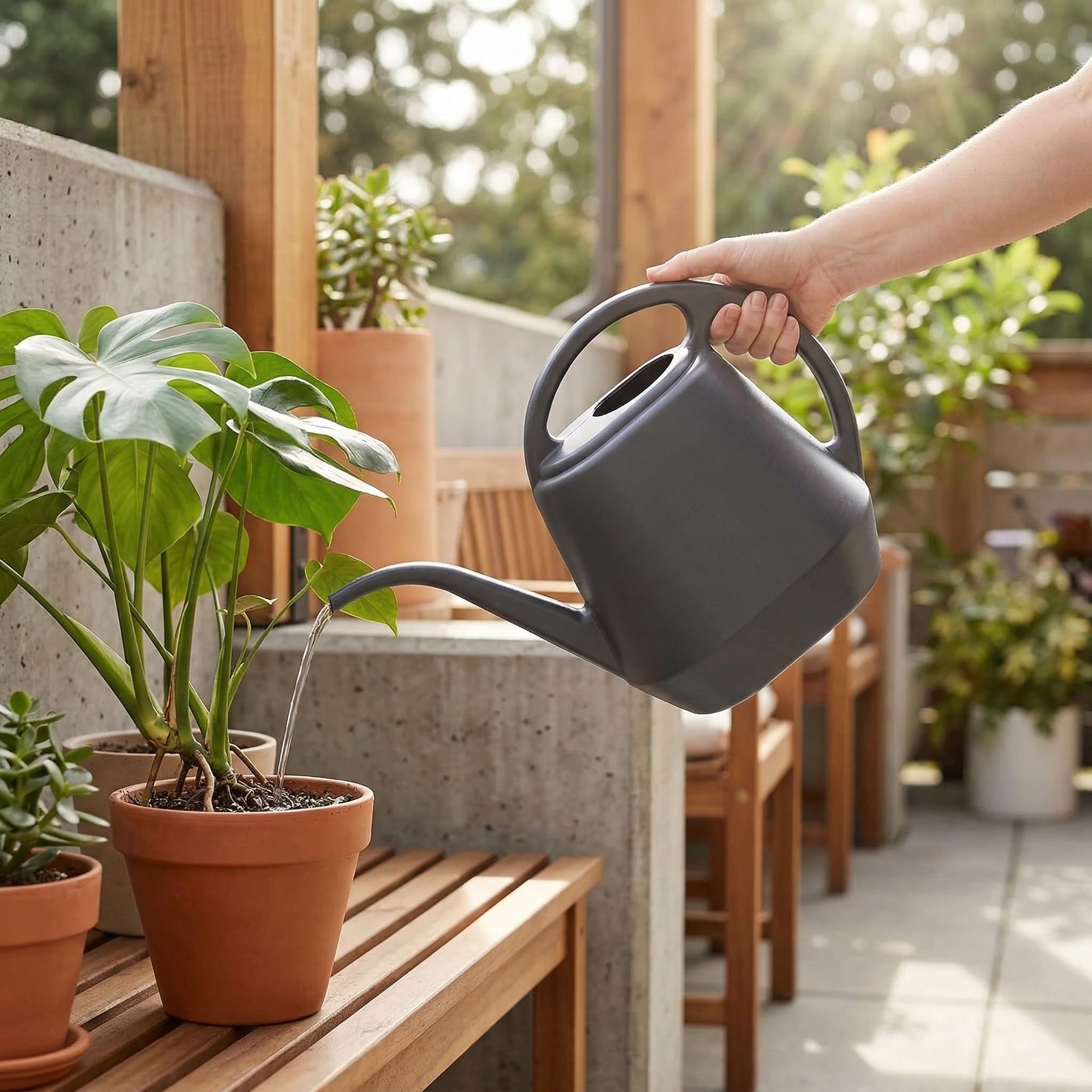 Fasmov grey watering can ideal for indoor plant care and gardening.