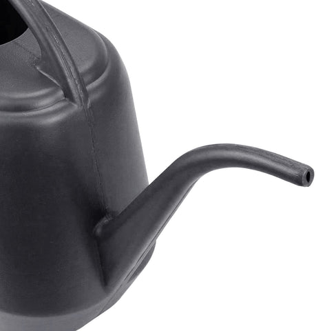 Fasmov long-spout design focused image for targeted watering between leaves.