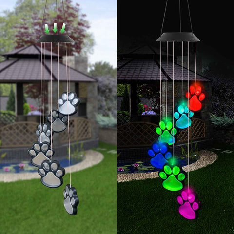 fasohere paw prints wind chimes close up with illuminated paw motifs powered by sun