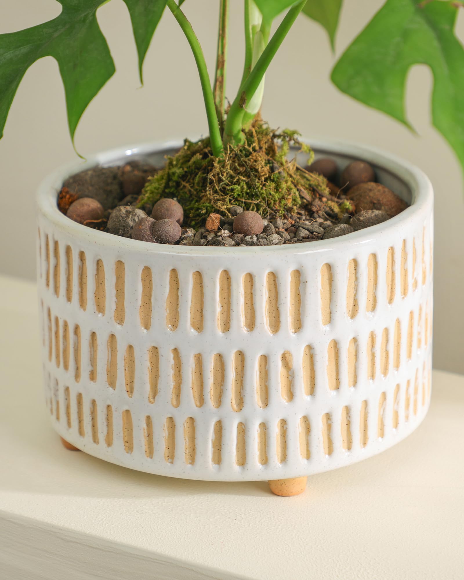 Fayoula pot features a non-slip bottom to protect furniture surfaces