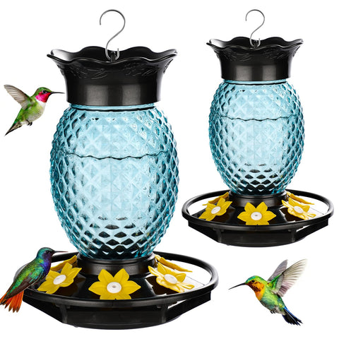Fchstaer blue glass pineapple feeder with six ports attracts multiple hummingbirds outdoors