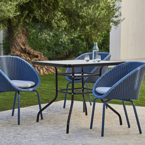 FDW patio table umbrella hole design enables shade while enjoying meals