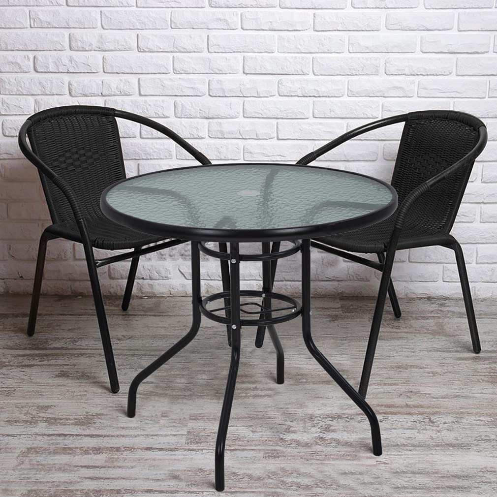 FDW outdoor table close-up shows tempered glass surface and shine.