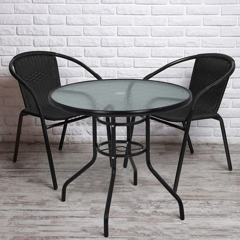 FDW outdoor table close-up shows tempered glass surface and shine.