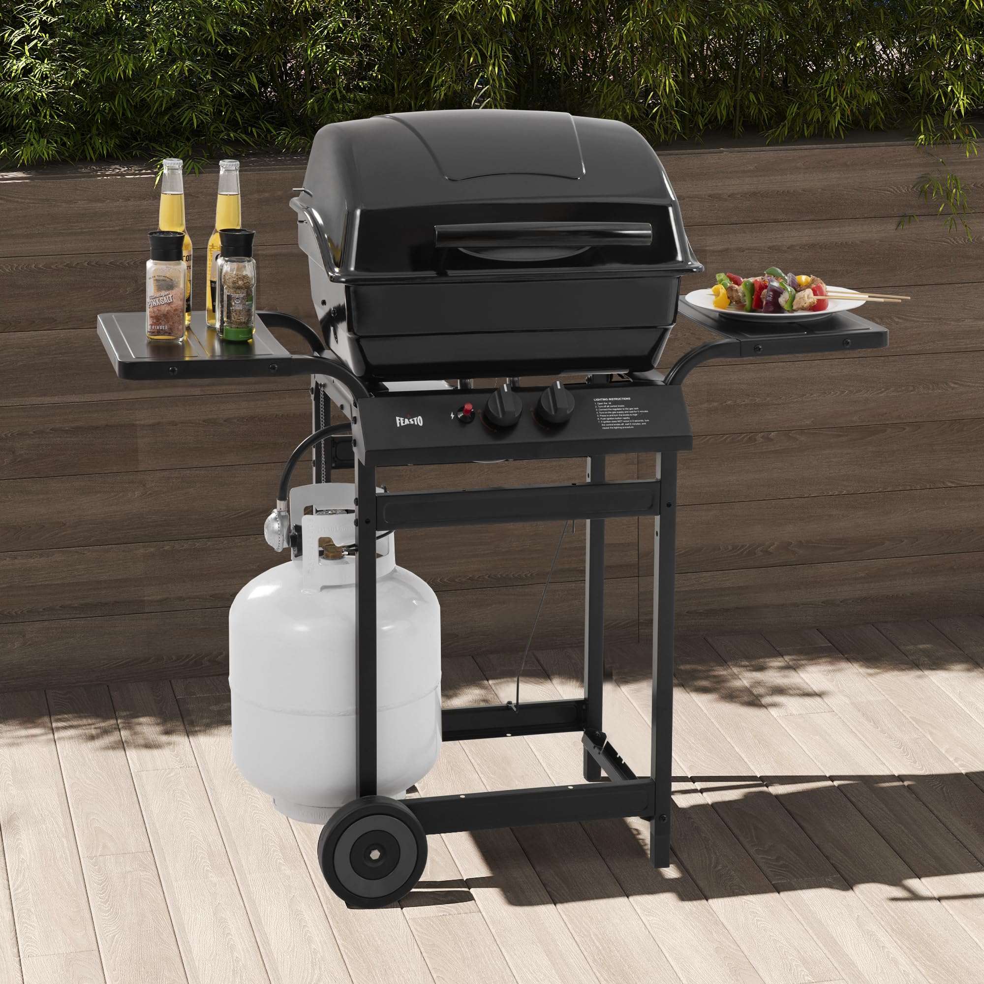 Feasto grill positioned in a backyard setting for poolside gatherings.