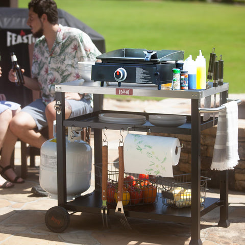Feasto stainless-steel tabletop provides sturdy prep space for grills and serving.