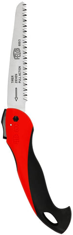 FELCO F600 folding saw in hand demonstrates precise pruning control.