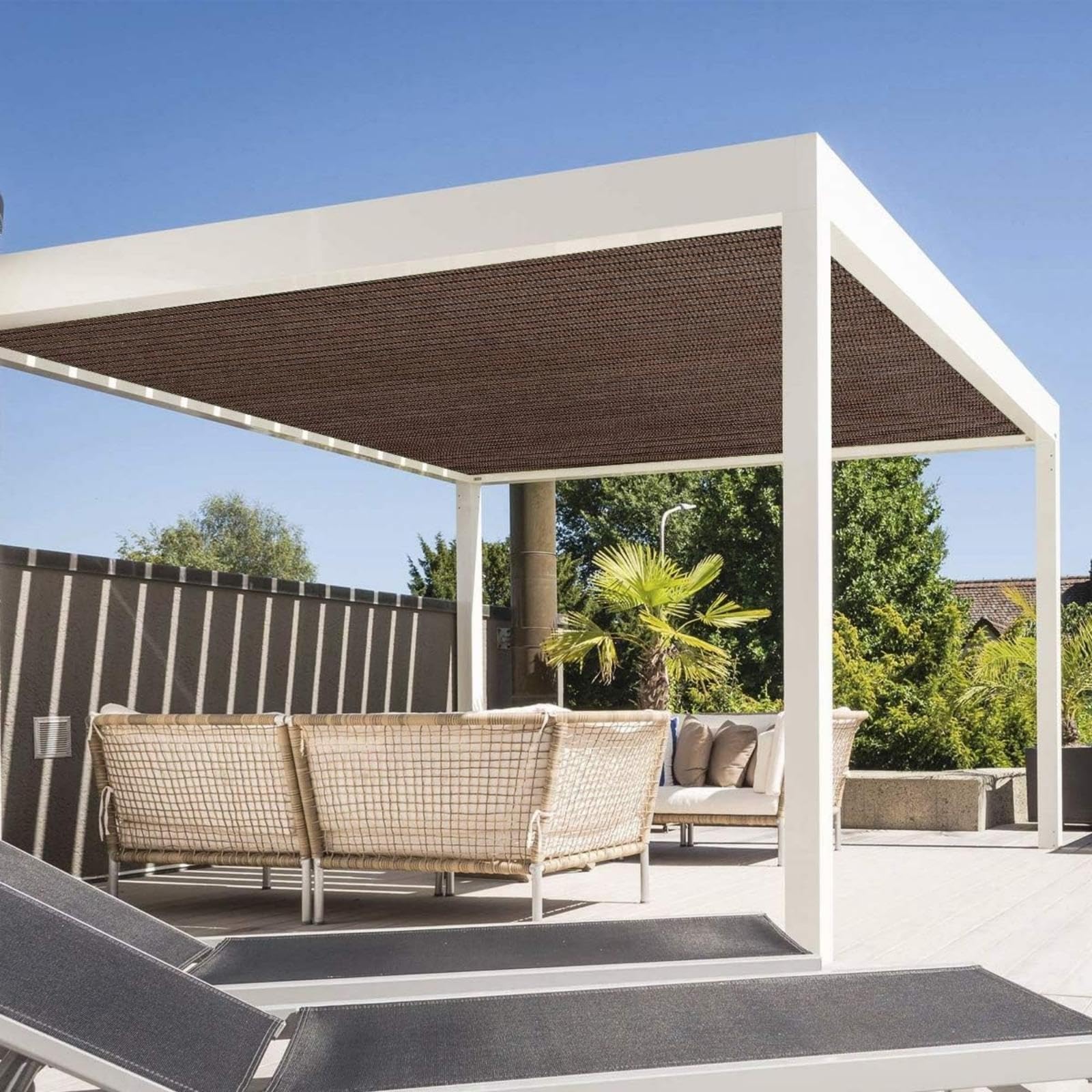 FFKQBH pergola shade cover protecting patio furniture and plants from sun.