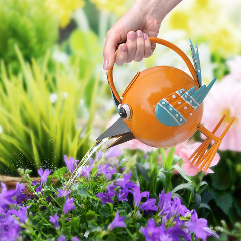 FGYPYLFF bird-shaped watering can outdoor setup in garden.