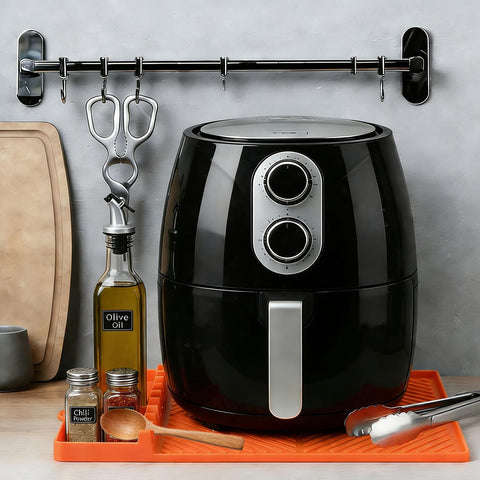 Find Law silicone tools mat orange cleans easily in dishwasher.