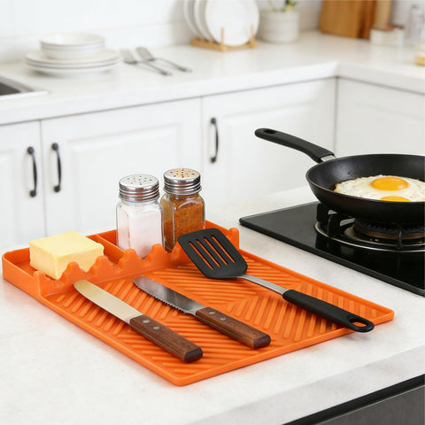 Find Law silicone tools mat orange acts as compact kitchen caddy.