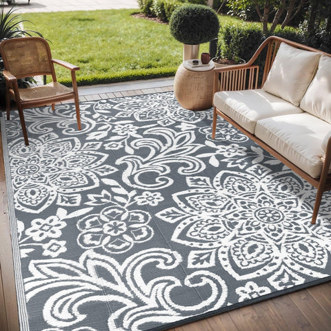 Findosom mandala reversible outdoor rug in gray for patio ambience.