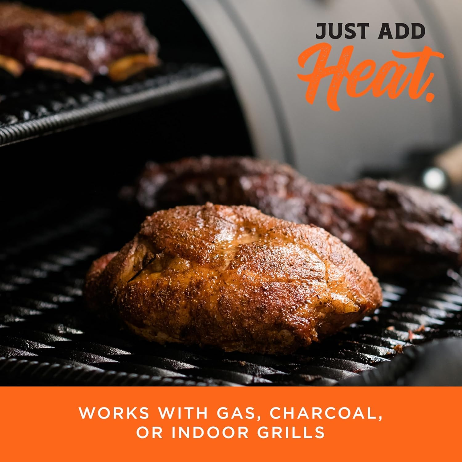 Fire & Flavor wood chunks in a foil pan enable controlled smoking.