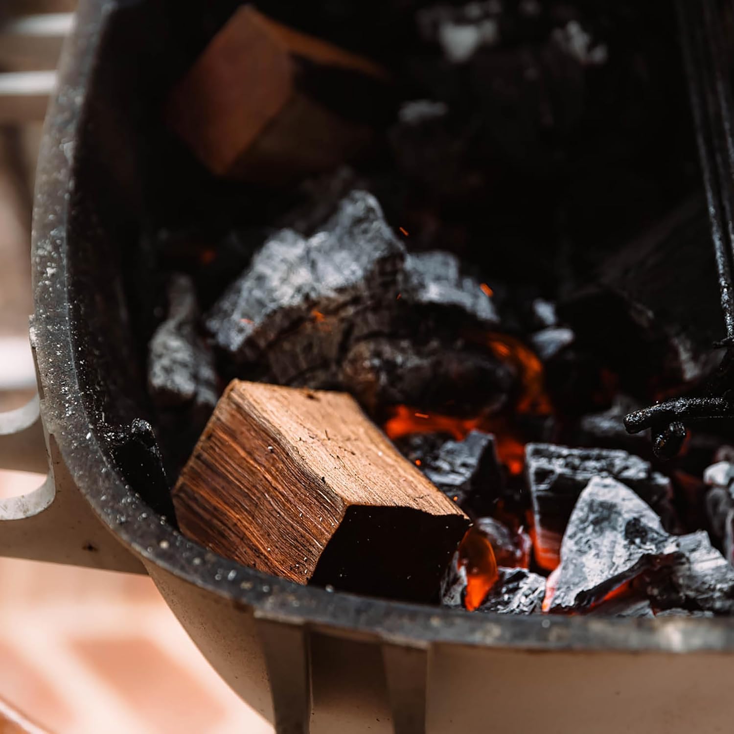 Packaging view of Fire & Flavor wood chunks in a natural bag.