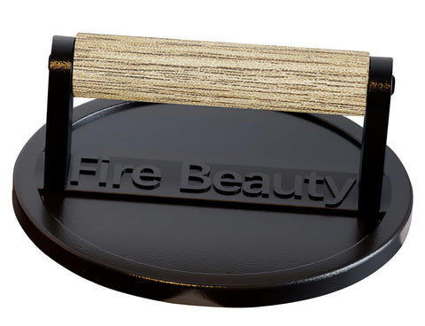 Fire Beauty burger press with 6.5-inch cast iron for even searing and crisp edges.