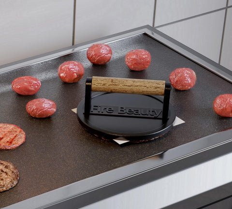 Fire Beauty wood-handle burger press stays cool while delivering flat juicy patties.