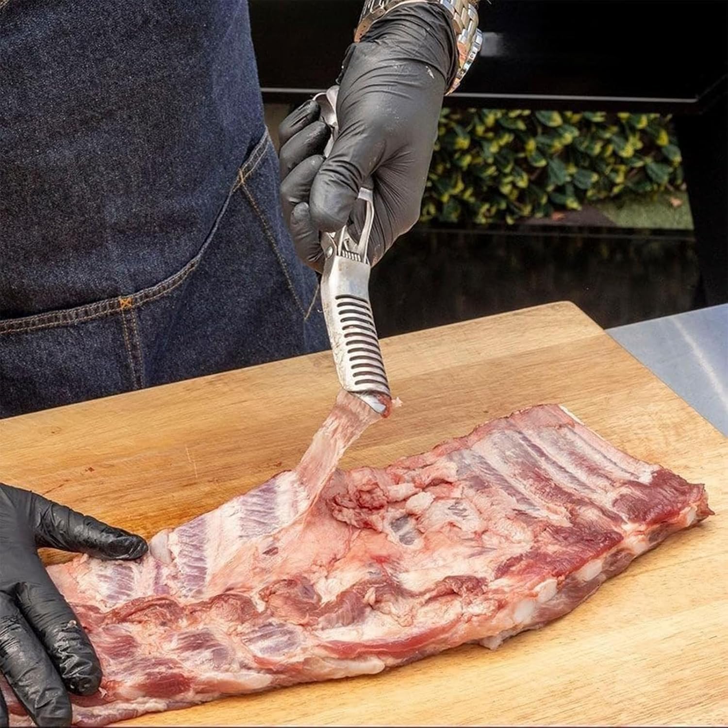 FirFiltr Rib Prep Tool Pro in use to streamline rib prep on the grill.