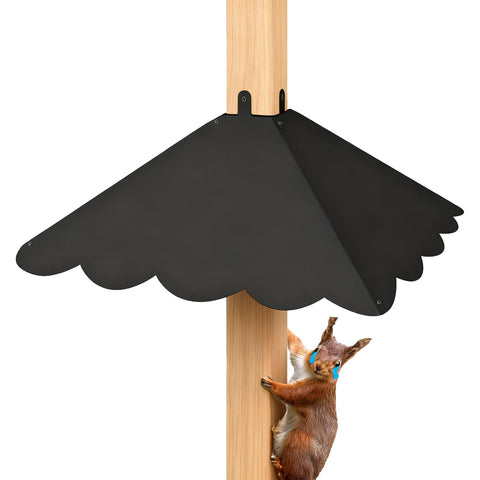 Firmlly metal squirrel baffle on a 4x4 post protects bird feeders from climbers.