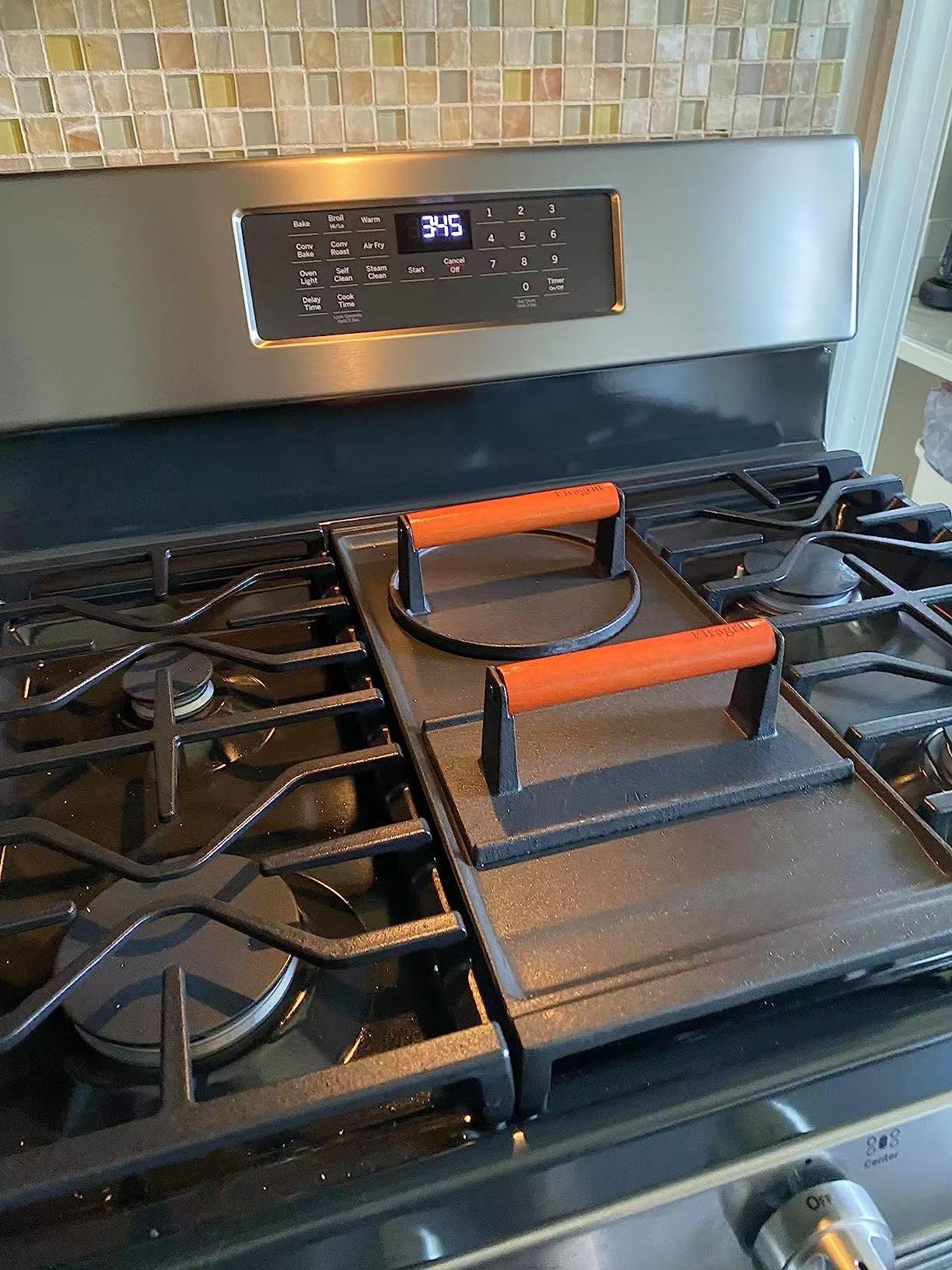 Firsgrill press on griddle demonstrates versatile kitchen tool for multiple uses
