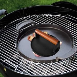 Firsgrill wood-handle detail showing sturdy grip and CNC branding.