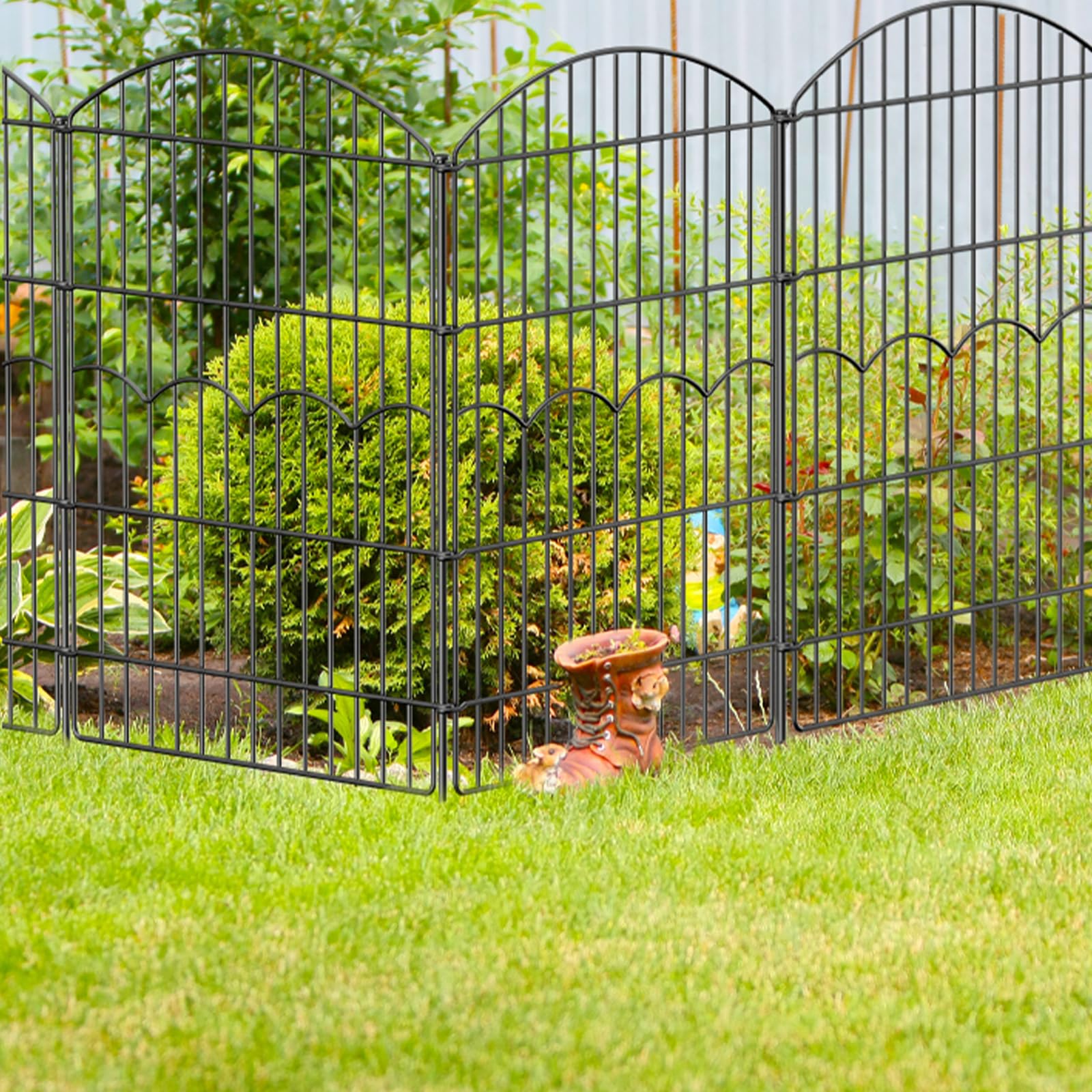 FIRSTNESS Patio border fence enhances curb appeal while keeping pets safe.
