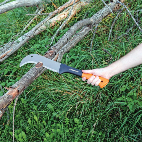 Fiskars Brush Axe in use clearing a trail outdoors
