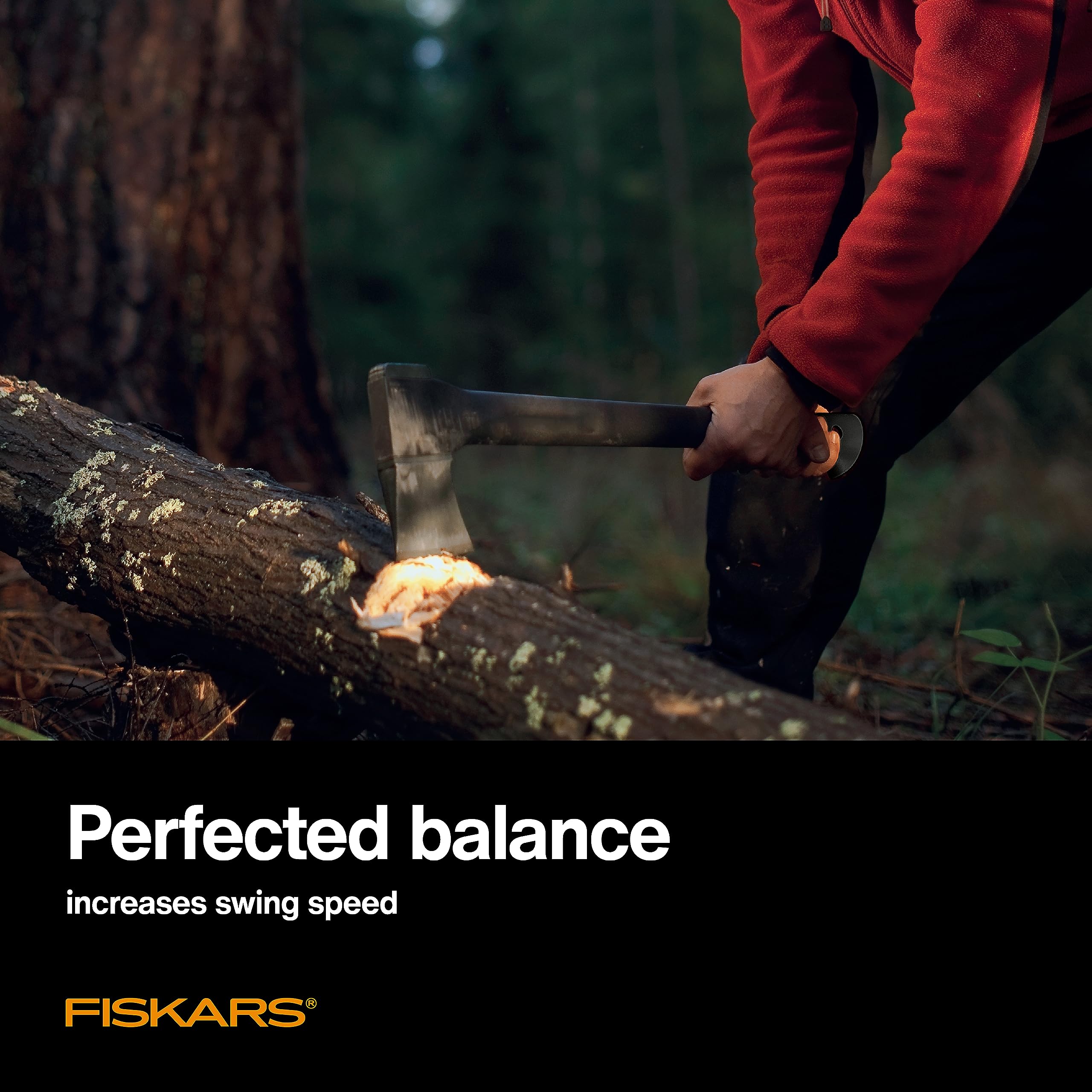 Fiskars chopping axe in forest setting ready for heavy chopping.