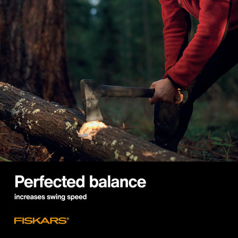 Fiskars chopping axe in forest setting ready for heavy chopping.