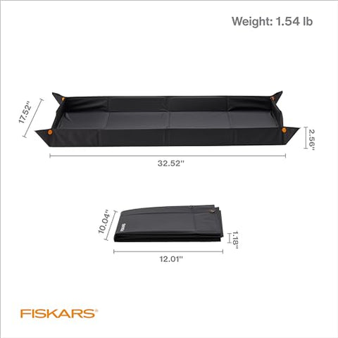 Fiskars Mat corners snapped to form firm sides containing soil and debris