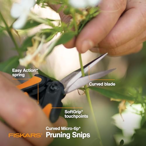 Fiskars curved-tip blade closeup enabling tight-space cuts.