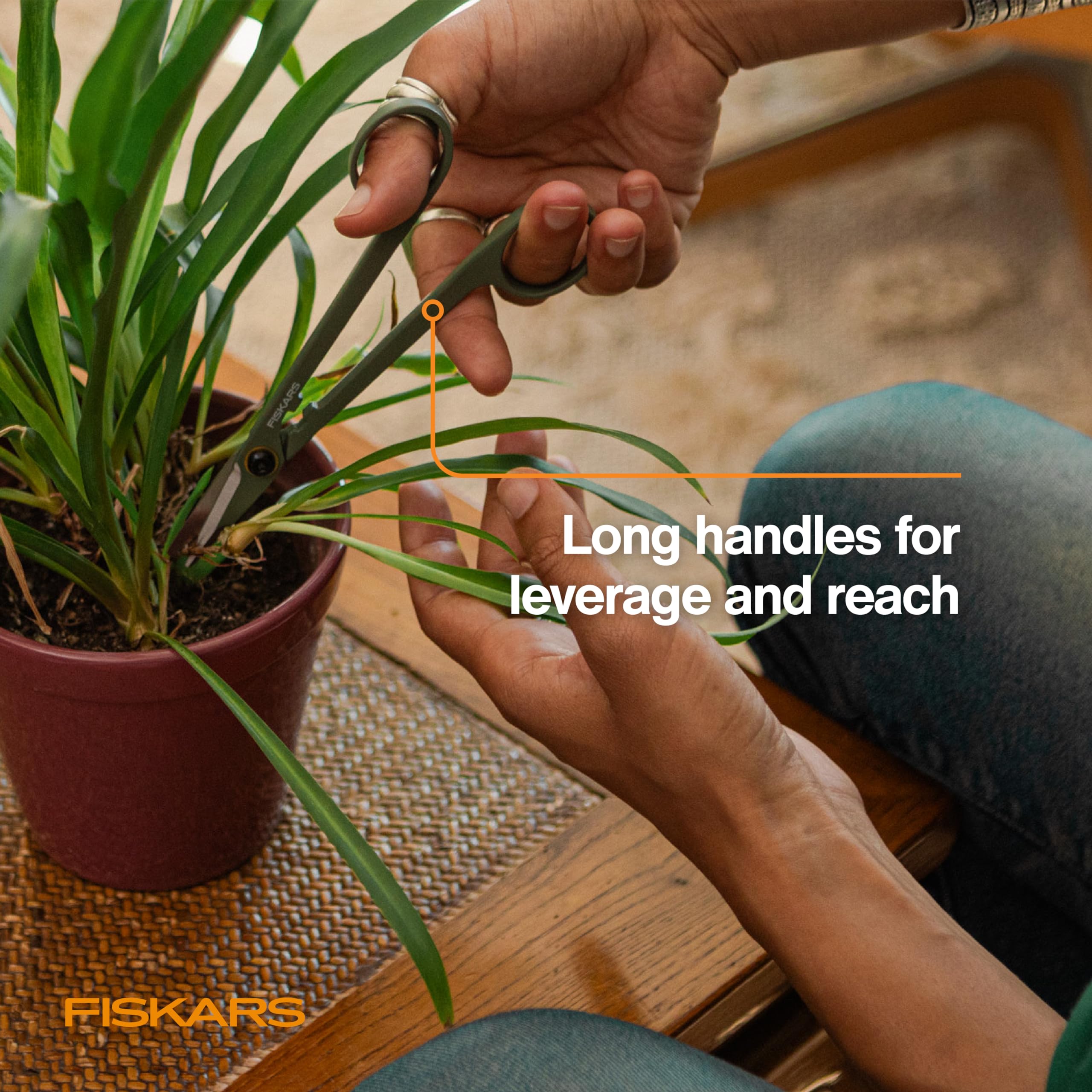 Ambidextrous handle on Fiskars Snipper for comfortable trimming.