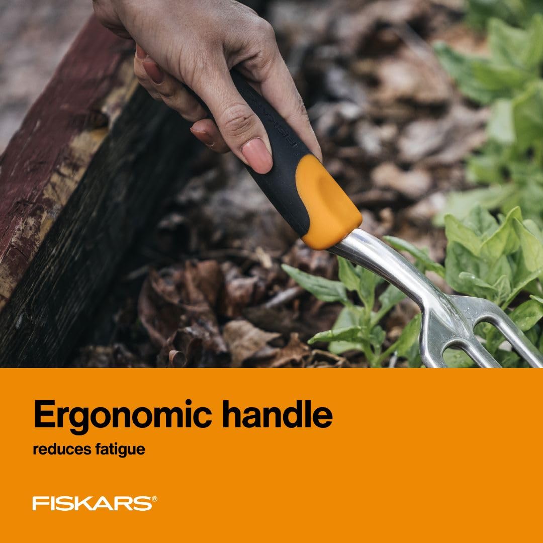 Fiskars Ergo Cultivator heavy-duty tines cut through tough turf smoothly.