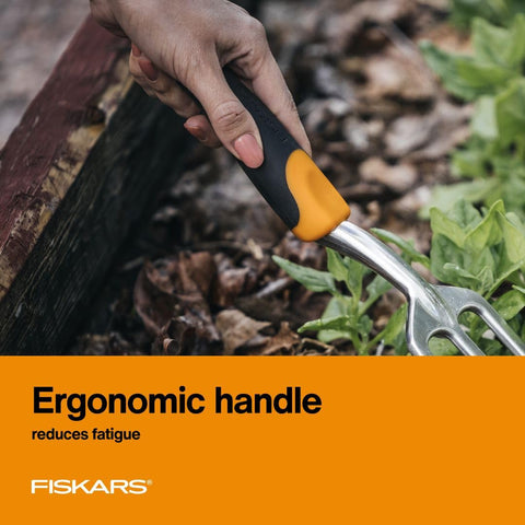 Fiskars Ergo Cultivator heavy-duty tines cut through tough turf smoothly.