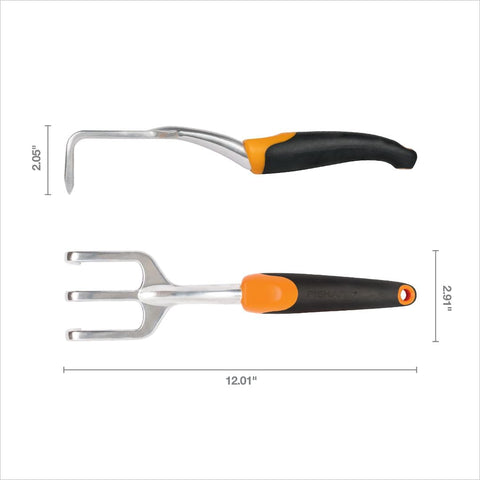 Fiskars Ergo Cultivator removing weeds in tight garden gaps.