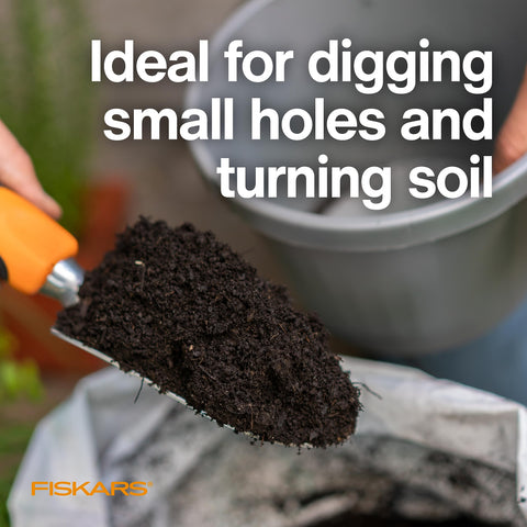 Fiskars Ergo Trowel showing hang hole for easy garden tool storage.