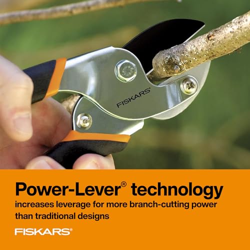 Ergonomic cushioned grip on the Fiskars pruner for comfort.
