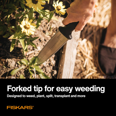 Fiskars Hori Hori serrated edge for sawing through thick growth with precision